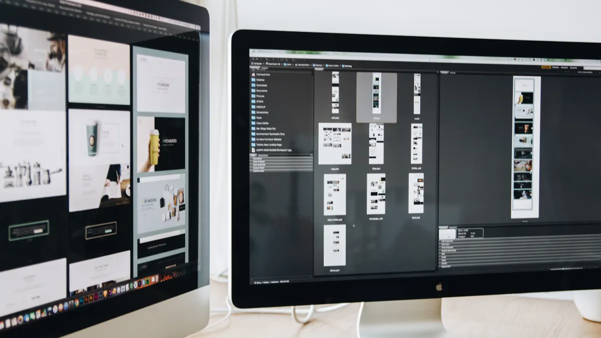 Desktop monitor displaying a website layout in progress